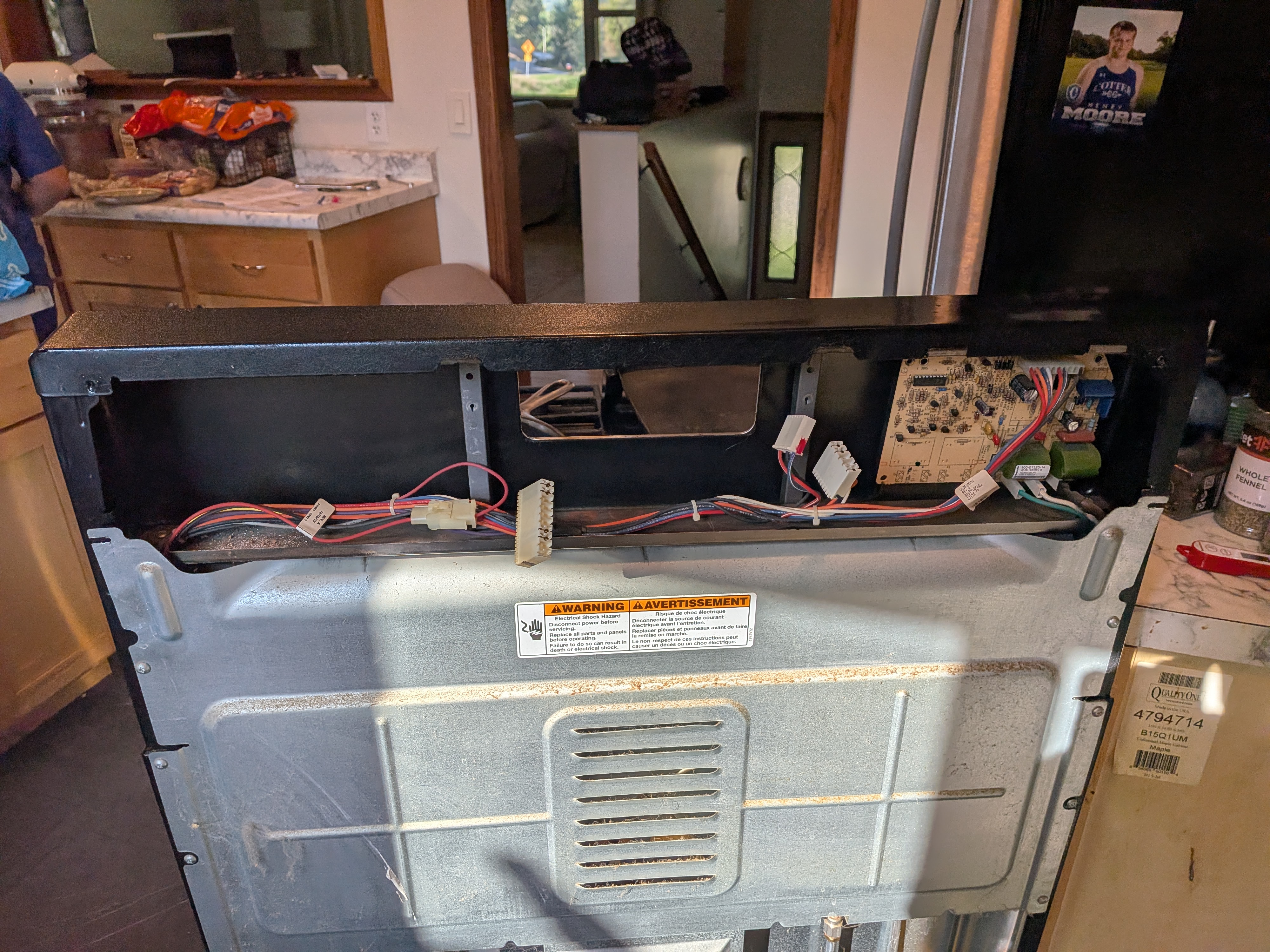 The back of the gas oven, control panel removed.