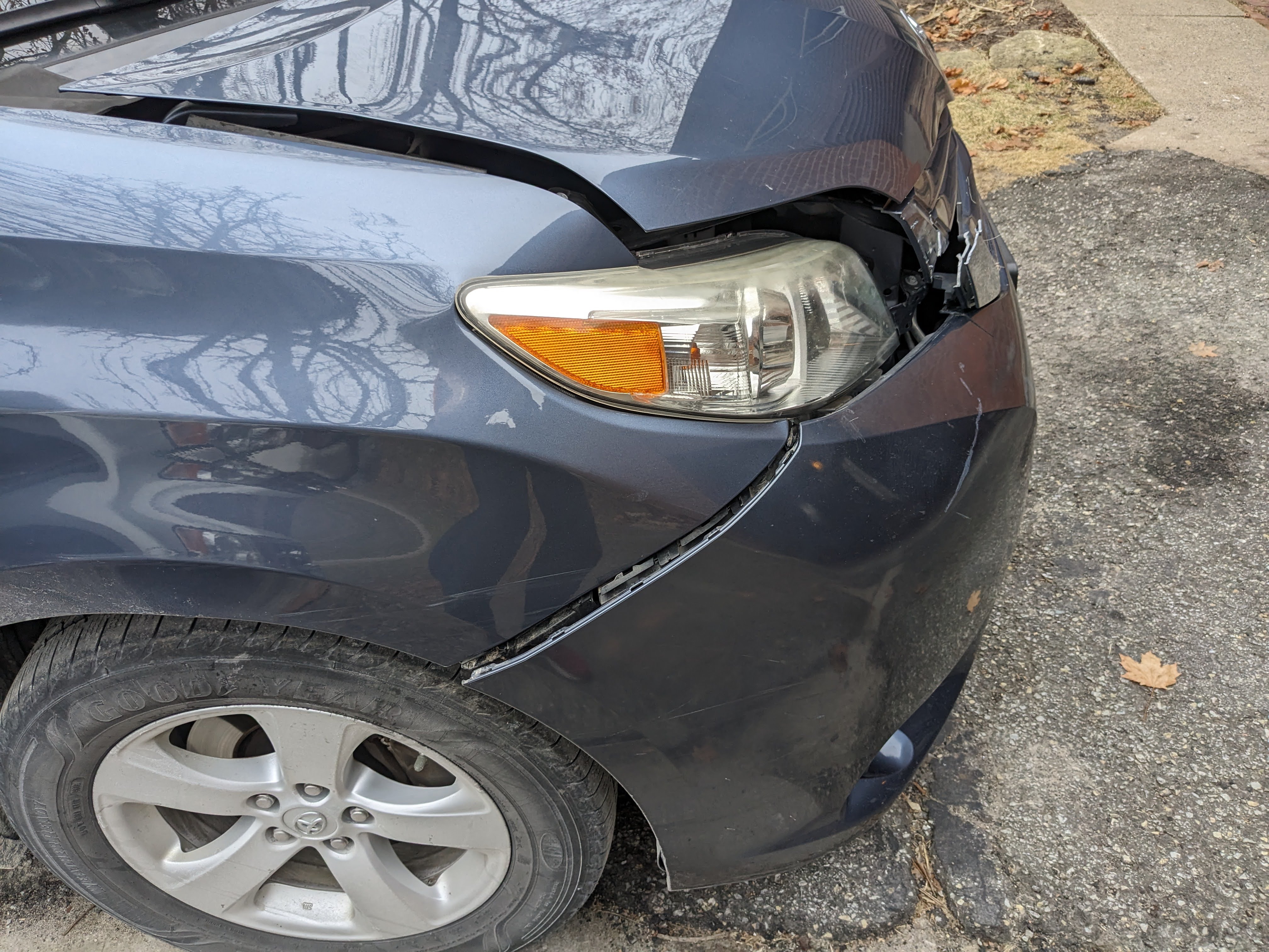 Picture of the damage done to a Toyota Sienna after hitting a deer.