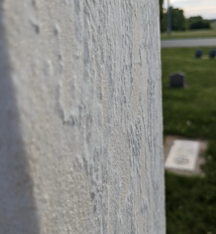 Side view showing marble erosion