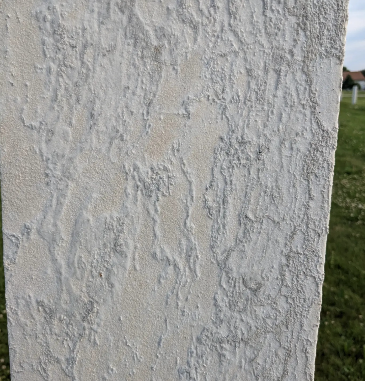 Side view showing marble erosion