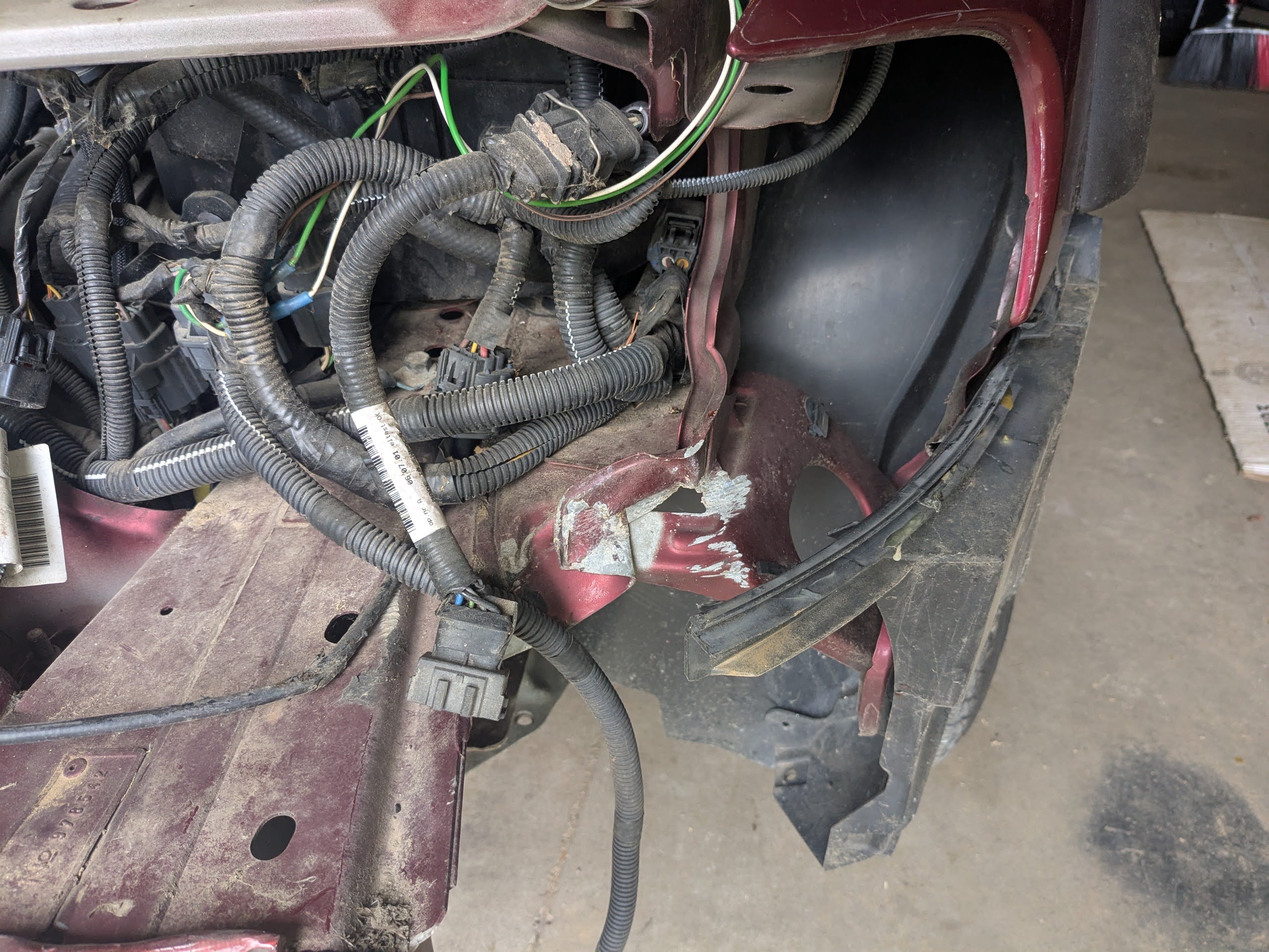 We discovered evidence of a previous impact on the driver's side of the car.